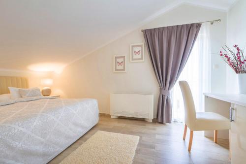 Ένα ή περισσότερα κρεβάτια σε δωμάτιο στο Luxury Apartments Villa Mande