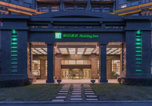 a building with a sign that reads kaspersky laboratory inn at Holiday Inn Mudanjiang by IHG in Mudanjiang