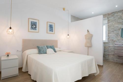 Posteľ alebo postele v izbe v ubytovaní Villa Sandra solo familias