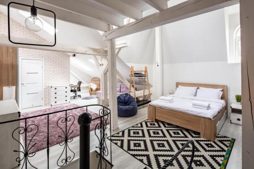 Кровать или кровати в номере Avangard French Le Ciel Apart