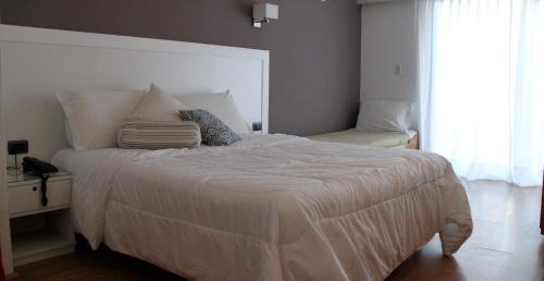 Hotel Milanoにあるベッド