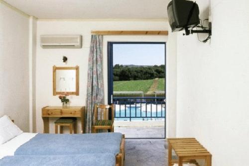 Postel nebo postele na pokoji v ubytování Lintzi Hotel