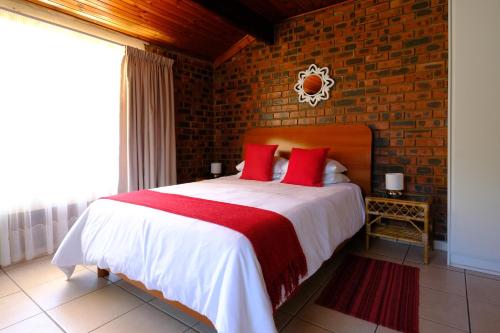 Łóżko lub łóżka w pokoju w obiekcie St Lucia Palms
