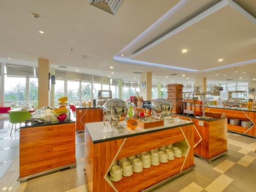 Restoran või mõni muu söögikoht majutusasutuses Grand Lagoi Hotel Bintan