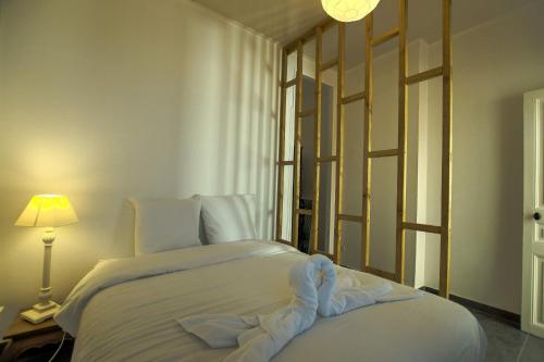 Postel nebo postele na pokoji v ubytování London