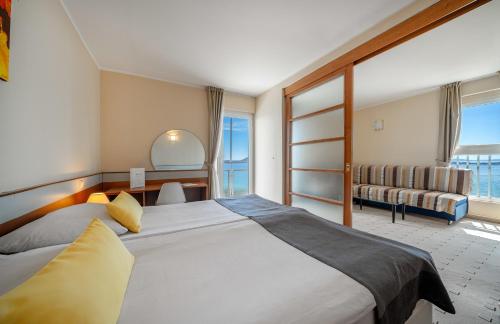 Posteľ alebo postele v izbe v ubytovaní Hotel Punta