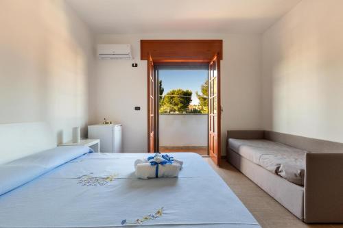 Postel nebo postele na pokoji v ubytování Joy Home B&B