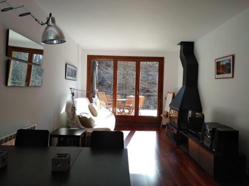 Posezení v ubytování Apartament amb pati a la Vall Fosca, tranquilitat i bones vistes