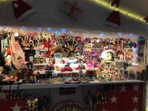 a room filled with christmas items and christmas decorations at La Maison de juliette in Saint-Hippolyte
