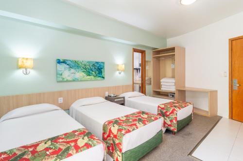 Katil atau katil-katil dalam bilik di Eko Residence Hotel - a 200m dos Hospitais da Santa Casa