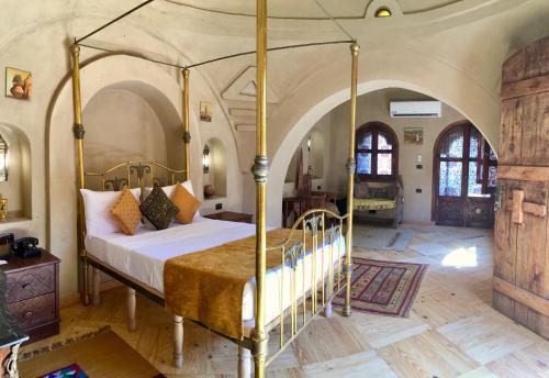 Ένα ή περισσότερα κρεβάτια σε δωμάτιο στο Djorff Palace