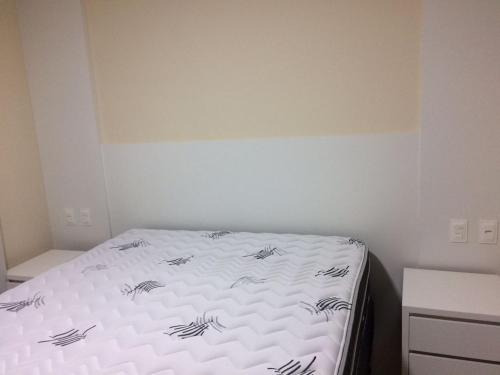 Cama o camas de una habitación en Apartamento novo na terra das Cataratas