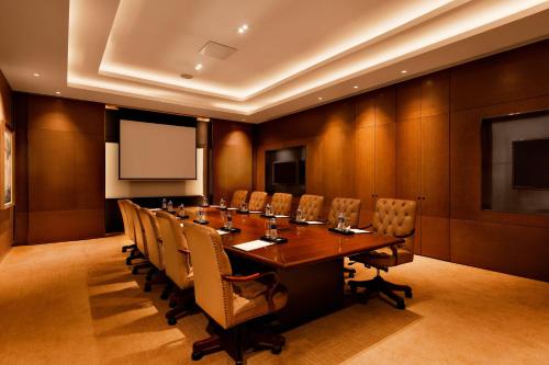 a conference room with a long table and chairs at Crowne Plaza Shanghai Anting-Auto City - 15 Minutes drive to F1 in Jiading