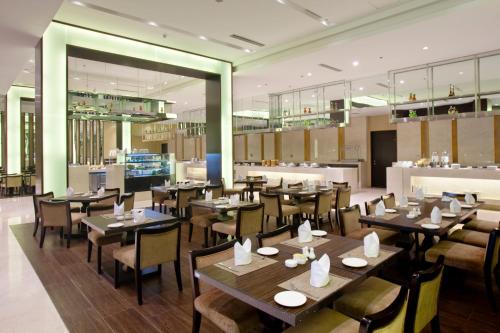 Un restaurant sau alt loc unde se poate mânca la Holiday Inn Mudanjiang, an IHG Hotel