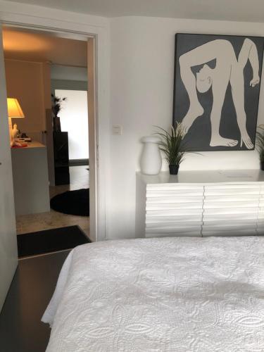 Katil atau katil-katil dalam bilik di Guesthouse Poppies , Free Parking