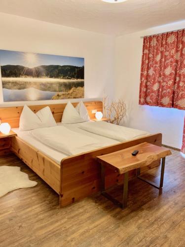 Postel nebo postele na pokoji v ubytování AlpenChalet Mitterberg