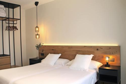 Cama o camas de una habitación en Hotel Boutique Astorga