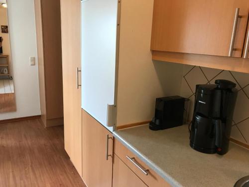 Kuchyň nebo kuchyňský kout v ubytování Steiner Strandappartements Appartement 210 Südseite mit seitlichem Meerblick