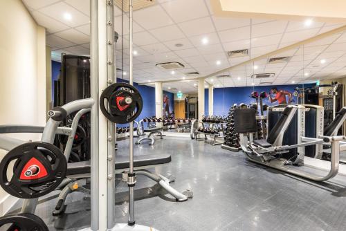 a gym with treadmills and cardio machines at Holiday Inn Lancaster by IHG in Lancaster
