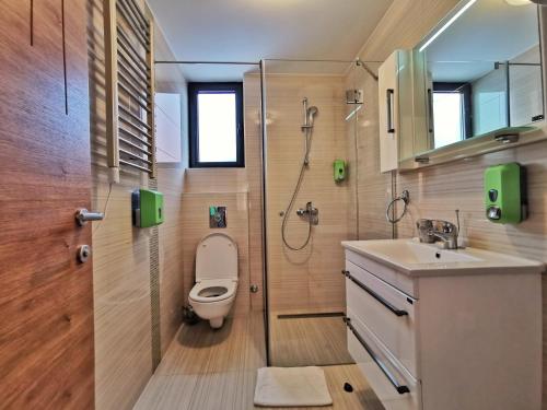 Koupelna v ubytování Apartments Egoiste - Centar