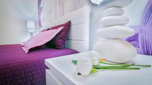 Łóżko lub łóżka w pokoju w obiekcie Casa Sant Elena ID15675