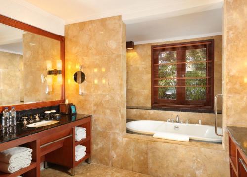 A bathroom at Villas at The Patra Bali Resort and Villas - CHSE Certified