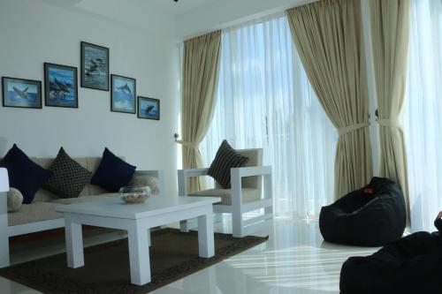 Zona de estar de BEACH HAVEN NILAVELI