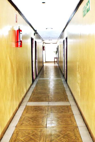 a hallway of an office building with a long corridor at Rufina's Leisure Center in Tagum