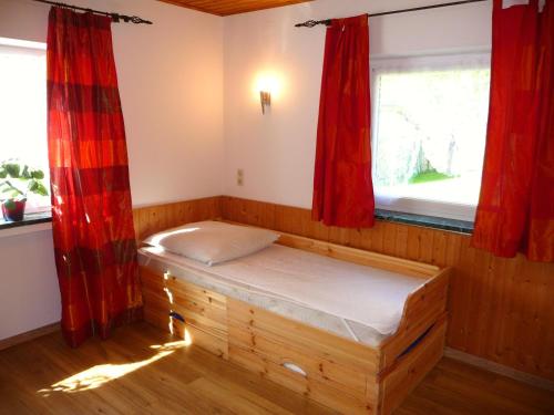 En eller flere senge i et værelse på Landhaus Alpenblick