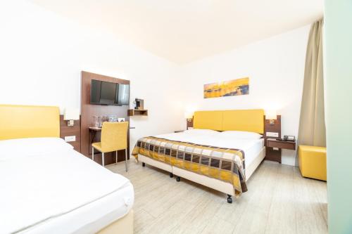 Postel nebo postele na pokoji v ubytování Hotel Rheinfelderhof