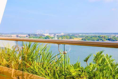 a balcony with a view of the water at Holiday Inn Tuxpan - Convention Center by IHG in Tuxpan de Rodríguez Cano