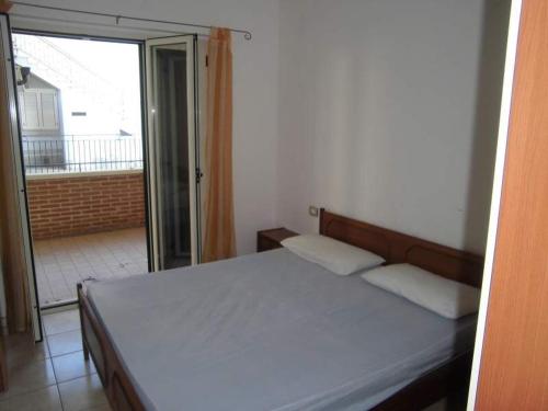 En eller flere senge i et værelse på La casa di Giò