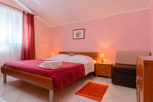 Posteľ alebo postele v izbe v ubytovaní Apartments Anton