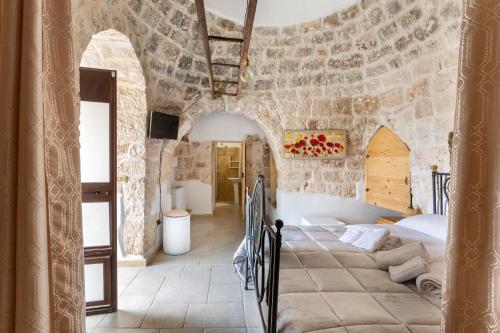 Postel nebo postele na pokoji v ubytování B&B Mariano