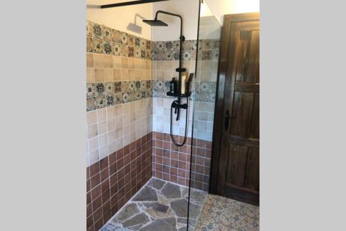 Kúpeľňa v ubytovaní Casa rural La Tahona del abuelo TR CC 00344