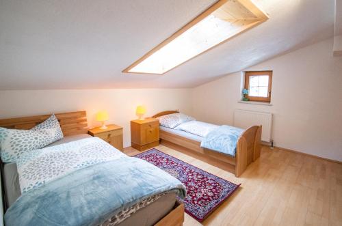 A bed or beds in a room at Ferienwohnung Kienast