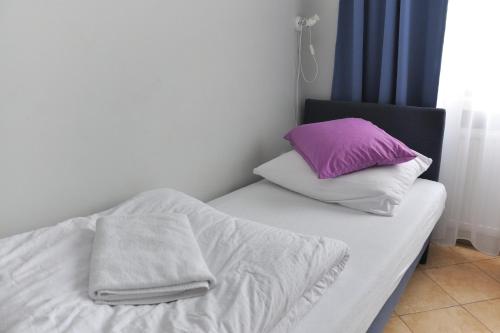 Postel nebo postele na pokoji v ubytování Hotel Elda 2