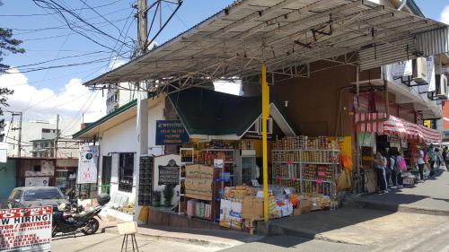 a store on the side of a street at 3BU Hostel Baguio - Session-Governor Pack in Baguio