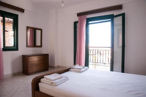Posteľ alebo postele v izbe v ubytovaní Mahis Apartment 1