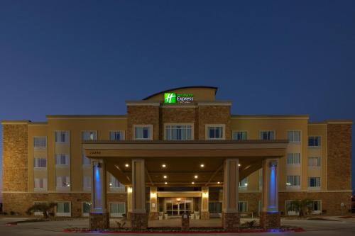 a hotel building with a sign on top of it at Holiday Inn Express & Suites Austin South-Buda by IHG in Buda
