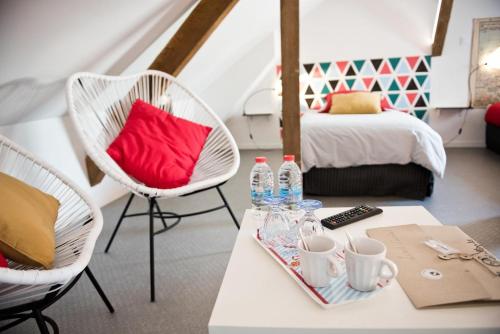 Postel nebo postele na pokoji v ubytování Gîte La feuille d'Acanthe