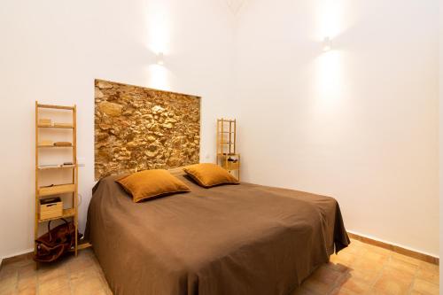 Postel nebo postele na pokoji v ubytování Casa BrancAzul