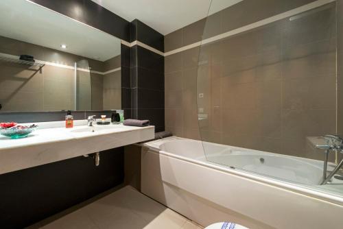 Et badeværelse på CCIB Forum Deluxe Apartment