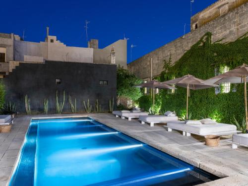 Palazzo Daniele, a Member of Design Hotelsの敷地内または近くにあるプール