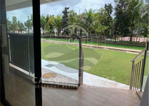 a view of a tennis court through a window at TimurBay Stunning By CA CON in Kuantan