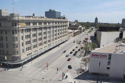 an aerial view of a street in a city at Holiday Inn & Suites Winnipeg Downtown by IHG in Winnipeg