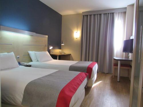 Katil atau katil-katil dalam bilik di Hotel Holiday Inn Express Madrid-Rivas, an IHG Hotel