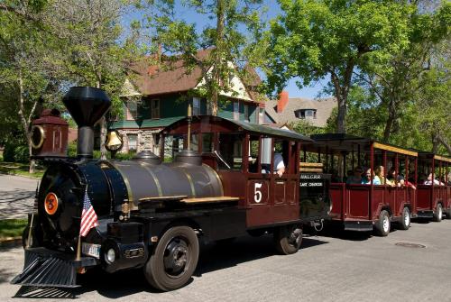 a small train with people riding on it at Holiday Inn Express and Suites Helena by IHG in Helena