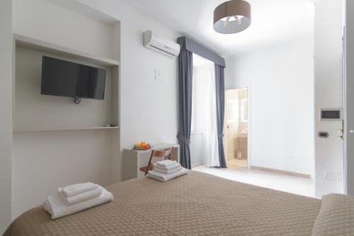 Postel nebo postele na pokoji v ubytování San Marco Hotel