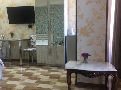 TV a/nebo společenská místnost v ubytování Hotel Tourist